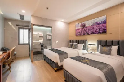 豪华三人房 — Le Saigon Grand Hotel